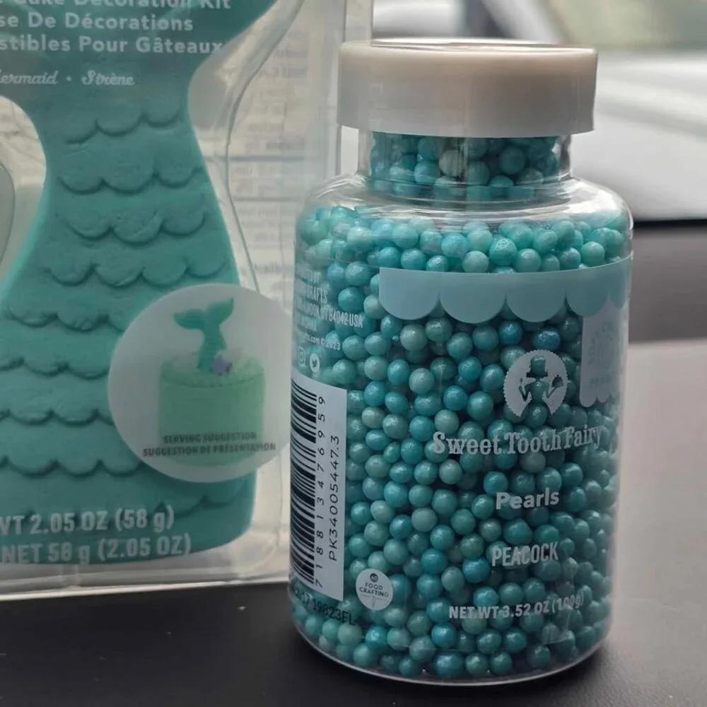 Mermaid tail cake toppers woth 2 jars of sprinkles. New in box Mermaid birthday